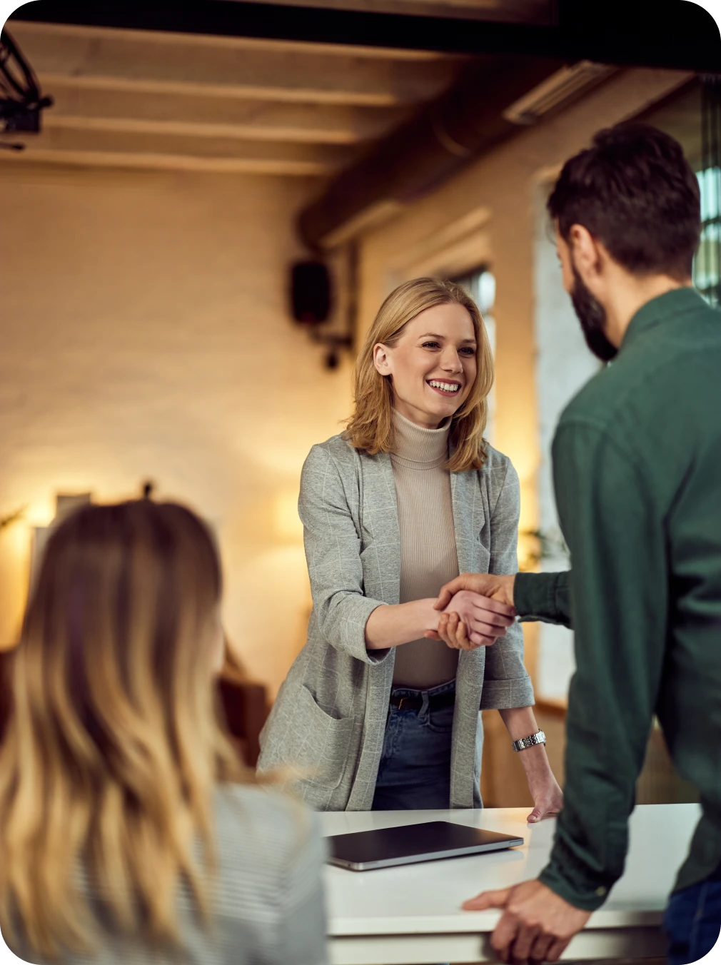 Colleagues greeting each other